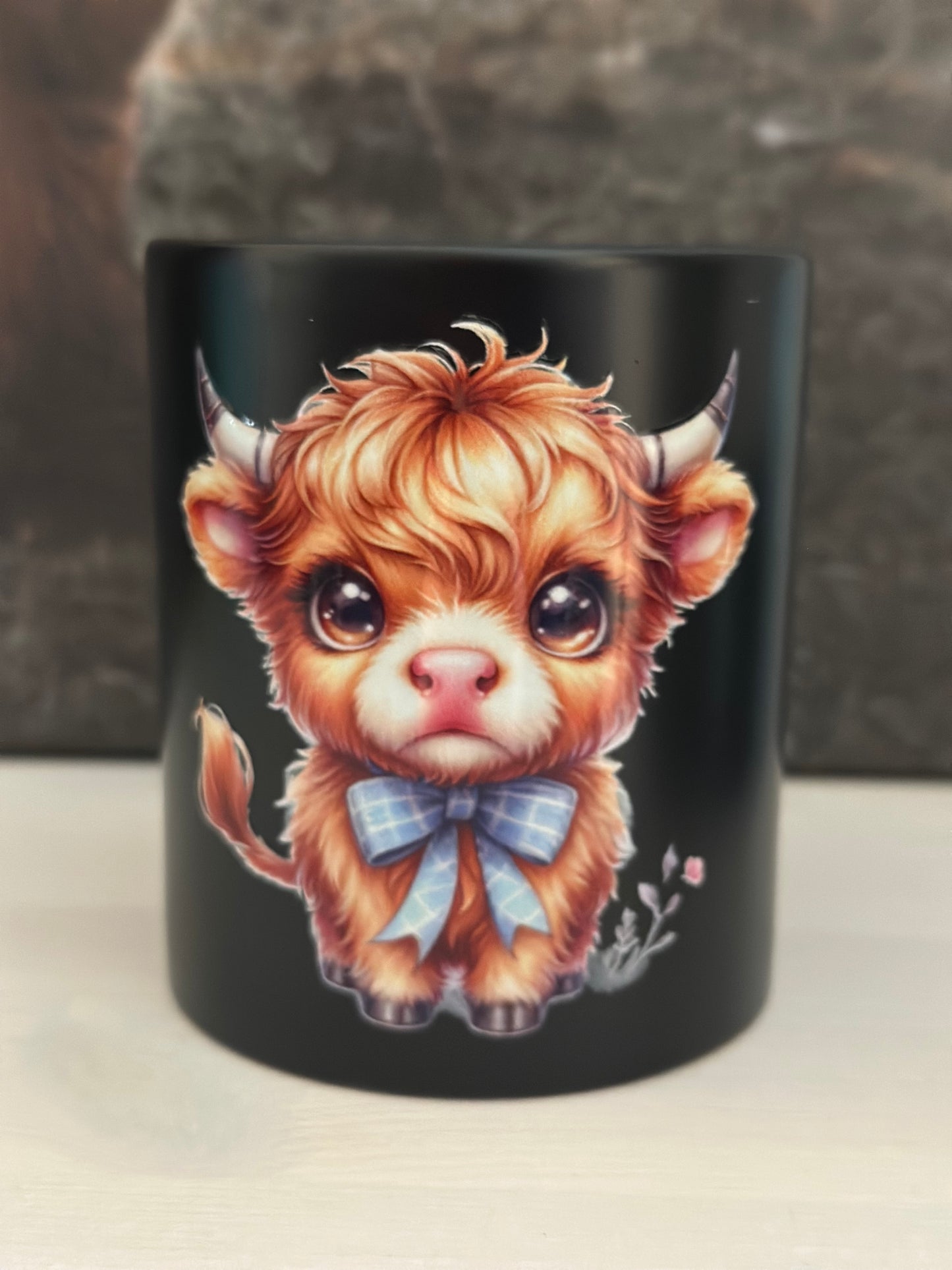 Tasse „Kuh mit blauer Schleife „ Schwarz